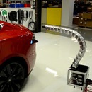 miniature pour Un chargeur à tête automatique pour Tesla