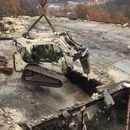 miniature pour Un engin de démolition porté par une grue