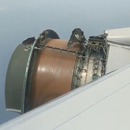 miniature pour Le réacteur d'un avion à découvert en plein vol
