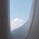 miniature pour Un OVNI filmé depuis la fenêtre d'un avion